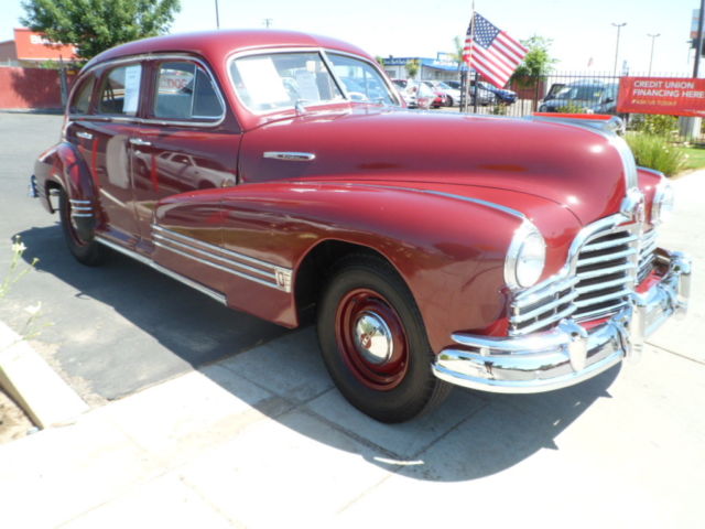 1946 Burgundy Pontiac Streamliner Sedan