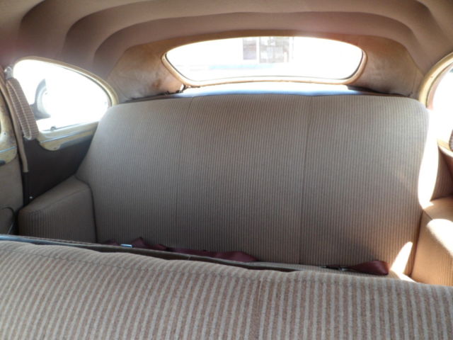 1946 Burgundy Pontiac Streamliner Sedan