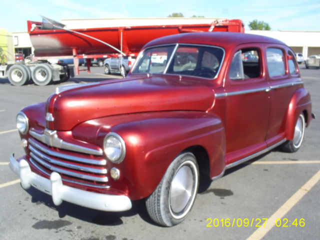 1947 Candy Apple Red Metalic Ford Delux 4 door