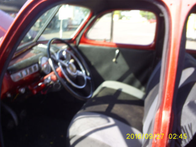 1947 Candy Apple Red Metalic Ford Delux 4 door