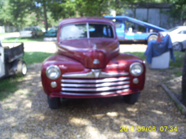 1947 Candy Apple Red Metalic Ford Delux 4 door