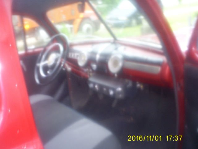 1947 Candy Apple Red Metalic Ford Delux 4 door