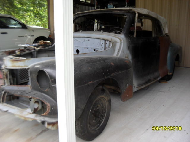 1947 black cherry Ford zephyr Coupe
