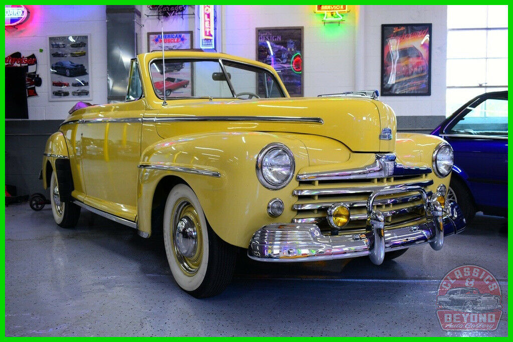 1947 Orange Ford Super Deluxe Convertible