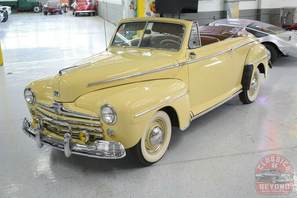 1947 Orange Ford Super Deluxe Convertible