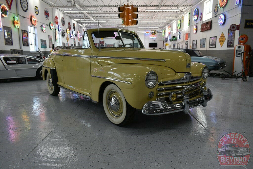 1947 Orange Ford Super Deluxe Convertible