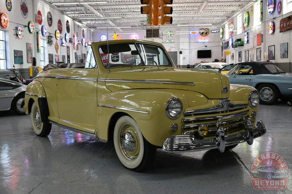 1947 Orange Ford Super Deluxe Convertible