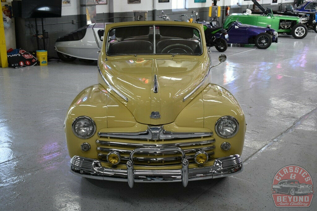1947 Orange Ford Super Deluxe Convertible