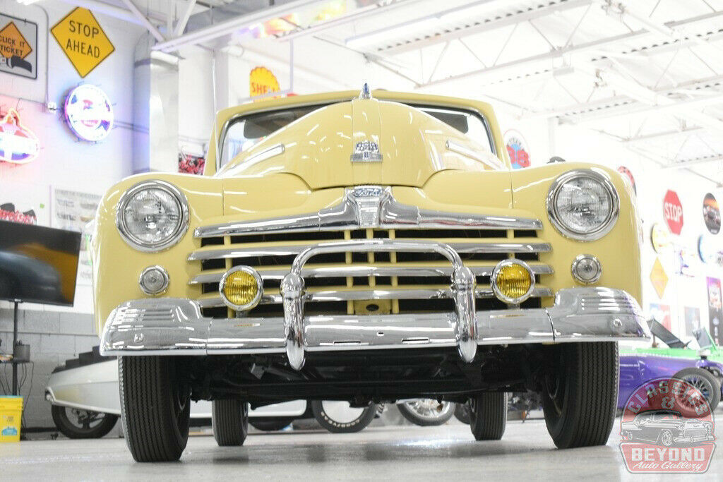 1947 Orange Ford Super Deluxe Convertible