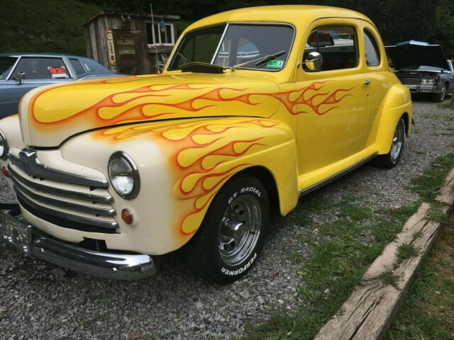 1948 Yellow Ford Deluxe Coupe Coupe