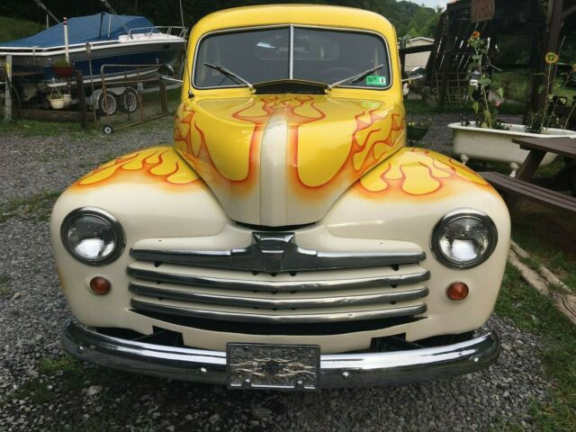 1948 Yellow Ford Deluxe Coupe Coupe