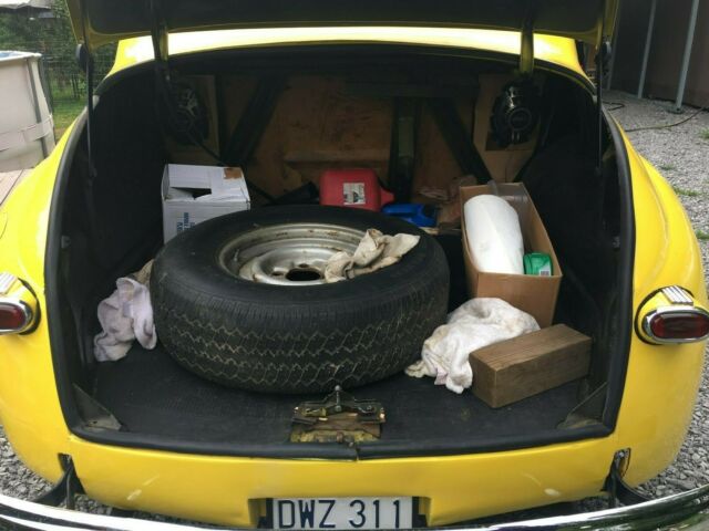 1948 Yellow Ford Deluxe Coupe Coupe