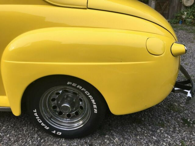 1948 Yellow Ford Deluxe Coupe Coupe