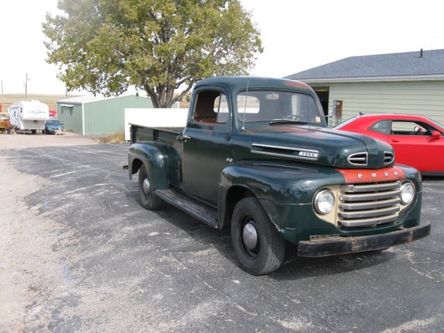 1948 green Ford F-100 pick up