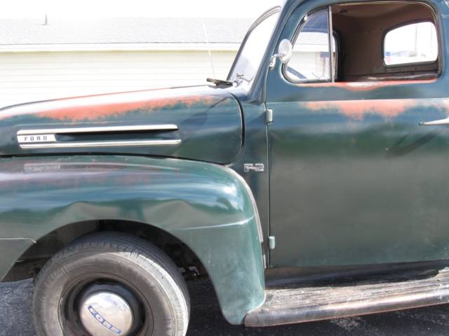 1948 green Ford F-100 pick up
