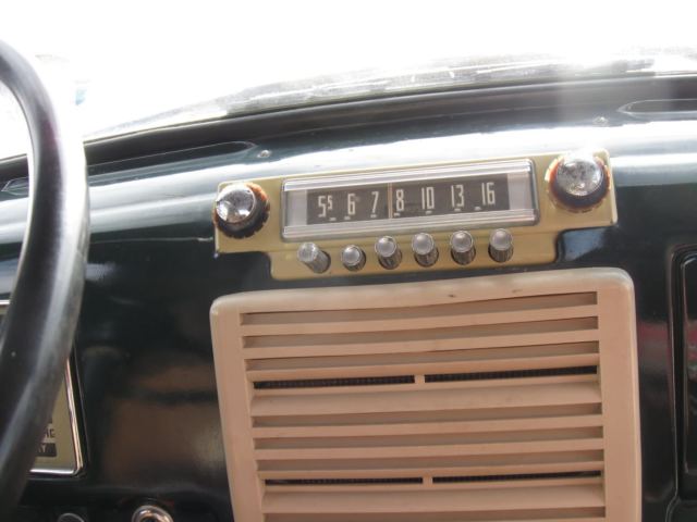 1948 green Ford F-100 pick up
