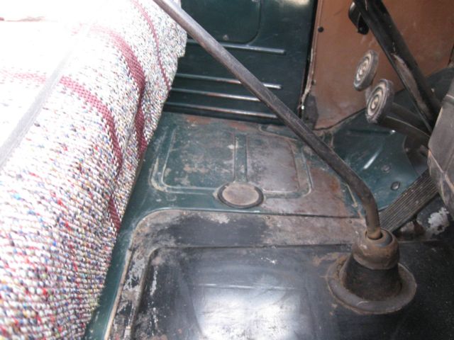 1948 green Ford F-100 pick up