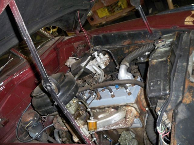 1948 Burgundy Ford COMMODORE Sedan