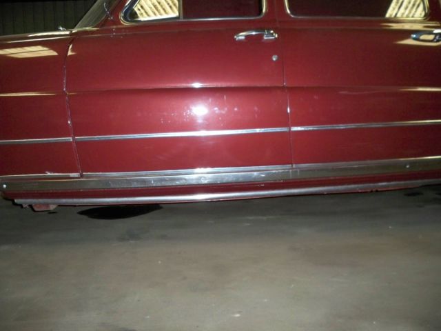 1948 Burgundy Ford COMMODORE Sedan