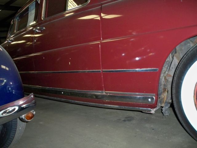 1948 Burgundy Ford COMMODORE Sedan
