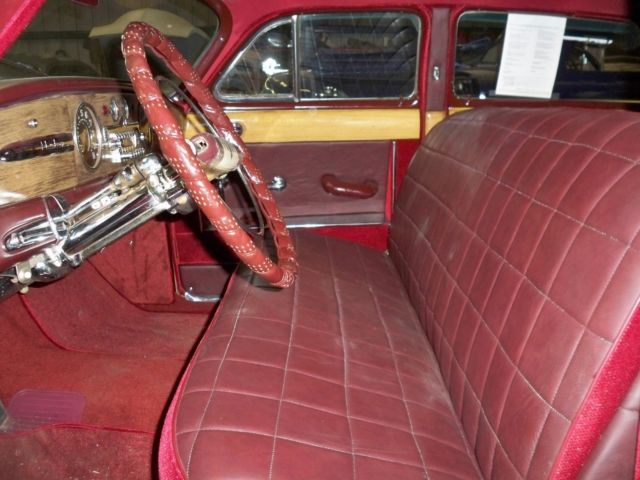 1948 Burgundy Ford COMMODORE Sedan
