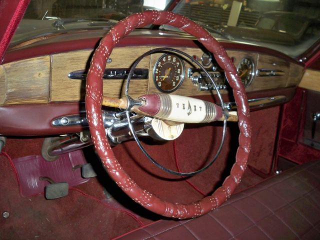 1948 Burgundy Ford COMMODORE Sedan