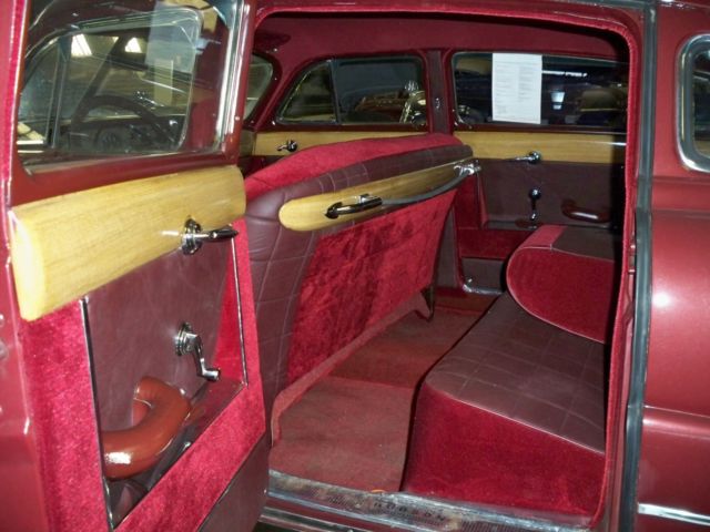 1948 Burgundy Ford COMMODORE Sedan