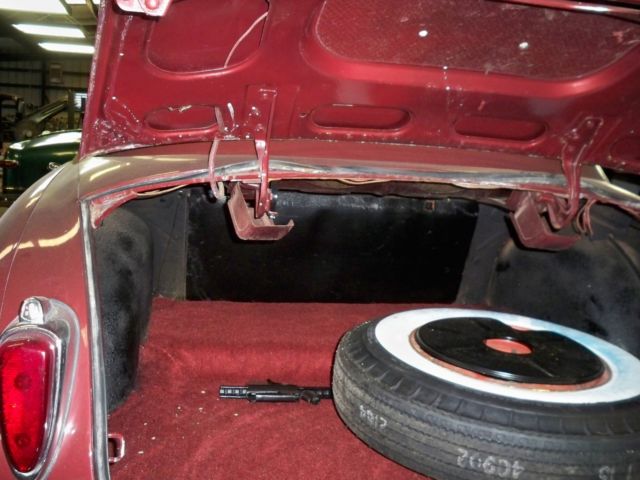 1948 Burgundy Ford COMMODORE Sedan