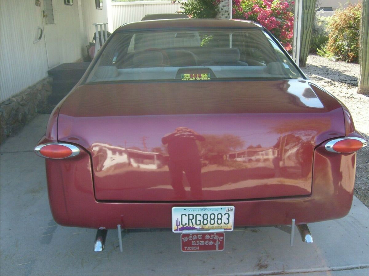 1949 Red Ford Thunderbird Coupe