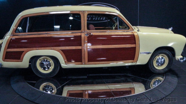 1949 Yellow Ford Woody Coupe