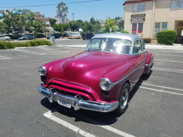 1949 Plum with Silver Top. Oldsmobile Eighty-Eight Coupe