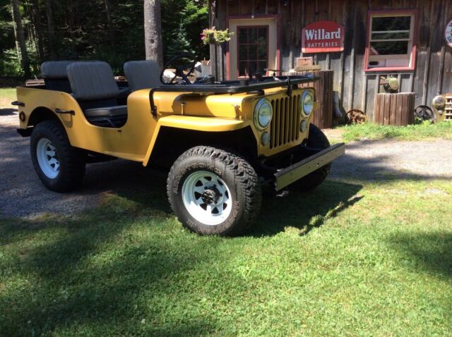 1949 Yellow Willys Jeep SUV