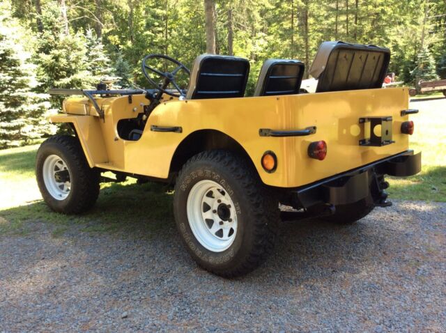 1949 Yellow Willys Jeep SUV