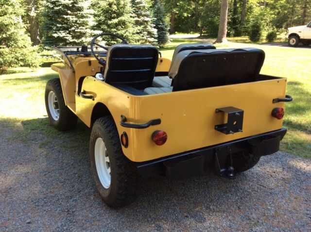 1949 Yellow Willys Jeep SUV