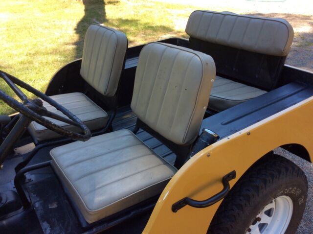 1949 Yellow Willys Jeep SUV