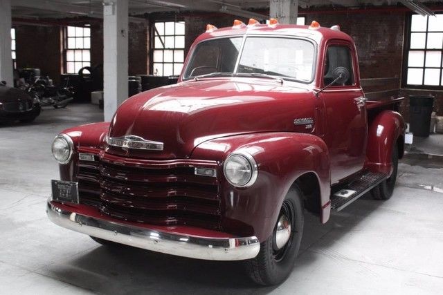 1950 Red Chevrolet Suburban Pickup Truck