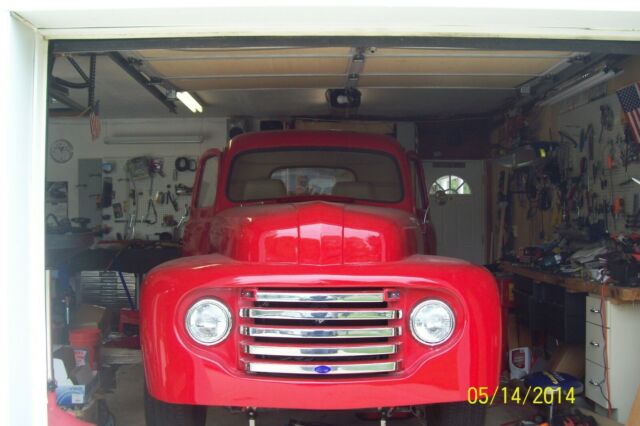 1950 red Ford F-100 Standard Cab Pickup