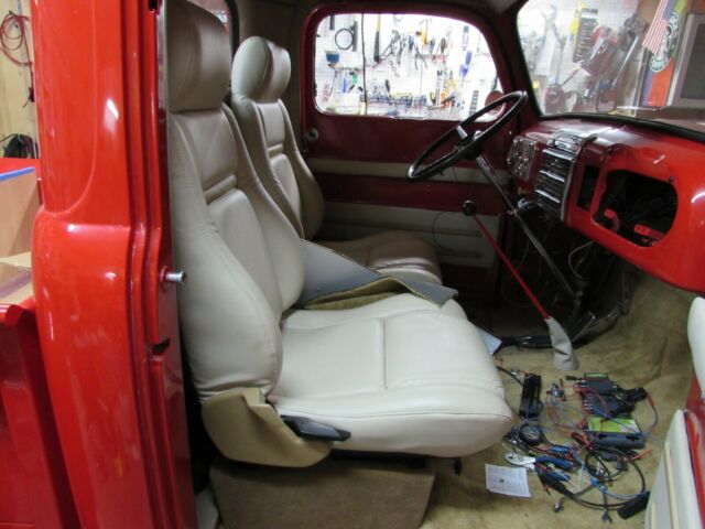 1950 red Ford F-100 Standard Cab Pickup