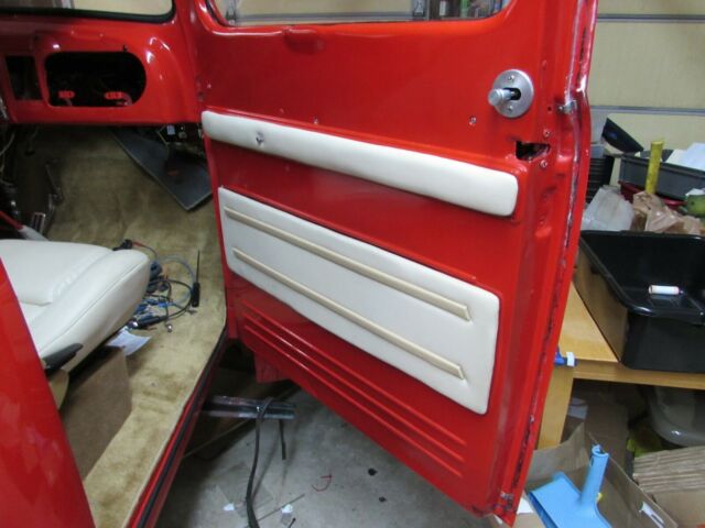 1950 red Ford F-100 Standard Cab Pickup