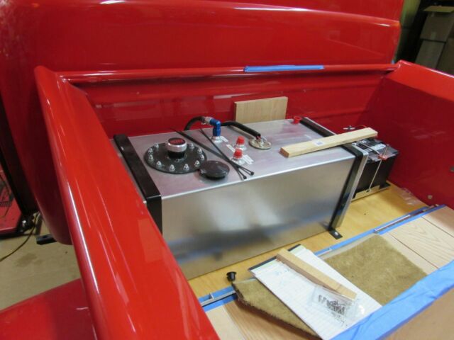 1950 red Ford F-100 Standard Cab Pickup