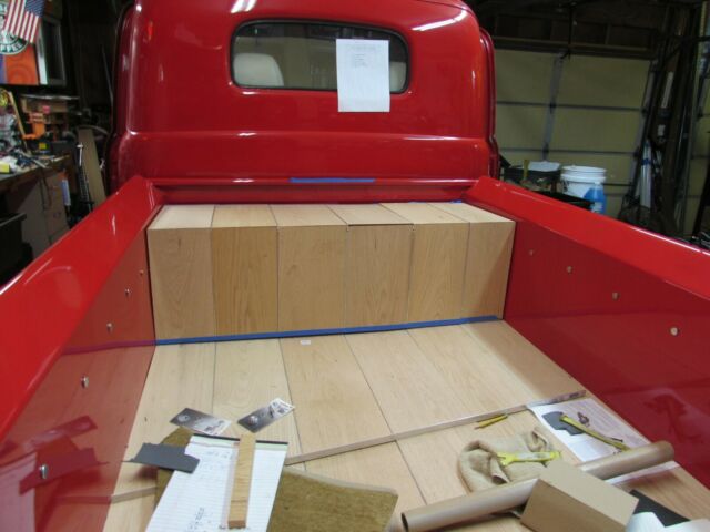 1950 red Ford F-100 Standard Cab Pickup