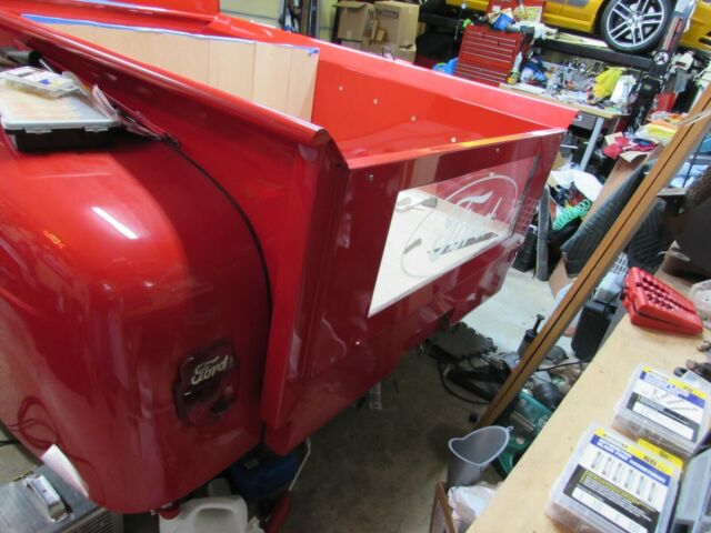 1950 red Ford F-100 Standard Cab Pickup