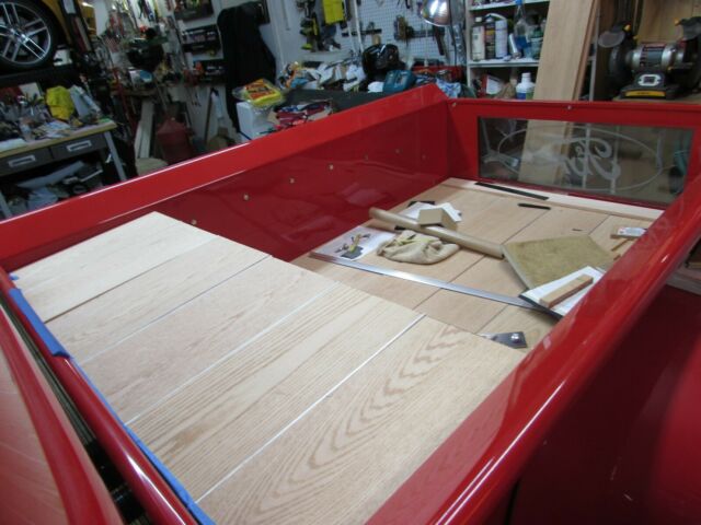 1950 red Ford F-100 Standard Cab Pickup