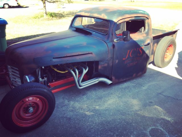 1950 Black, red, rust Ford F-100 Chopped pickup