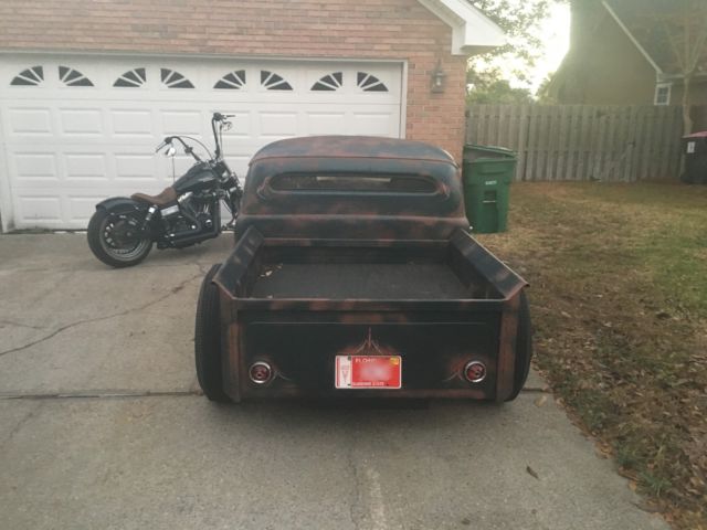 1950 Black, red, rust Ford F-100 Chopped pickup