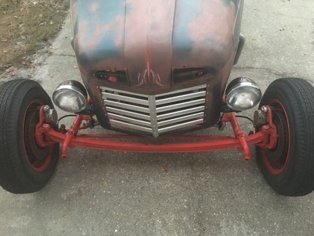 1950 Black, red, rust Ford F-100 Chopped pickup