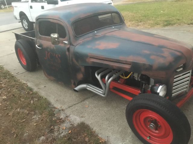 1950 Black, red, rust Ford F-100 Chopped pickup
