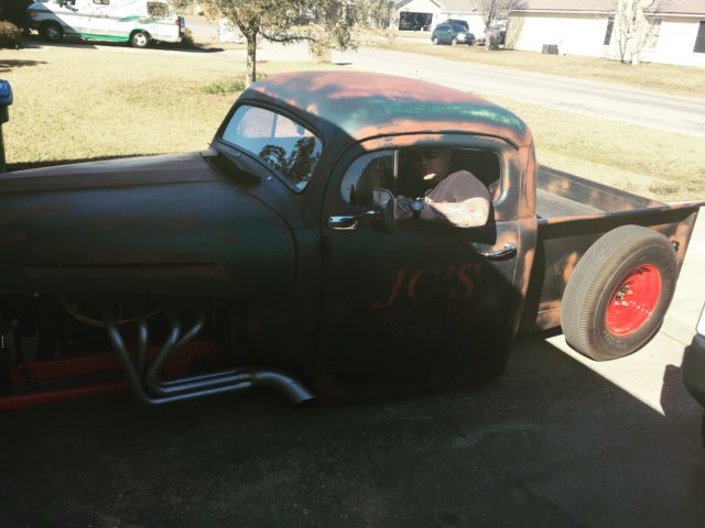 1950 Black, red, rust Ford F-100 Chopped pickup