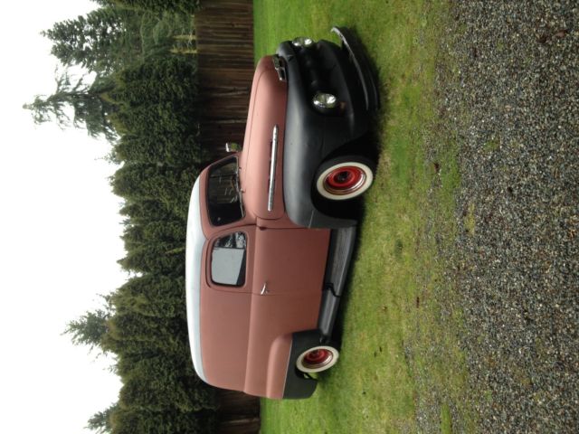 1951 Red and Black primer Ford F-100 panel