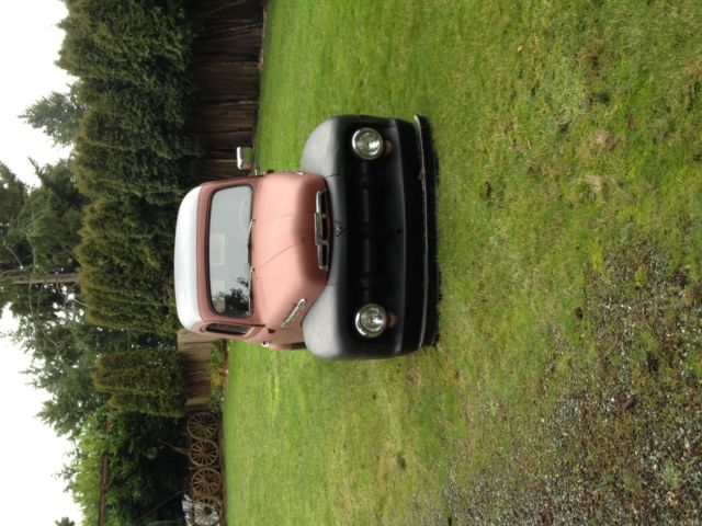 1951 Red and Black primer Ford F-100 panel